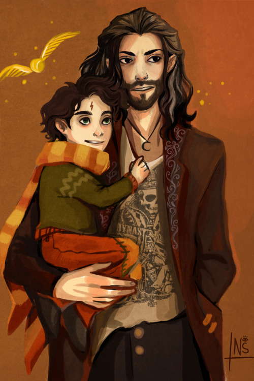 Sirius Black holding baby Harry Potter