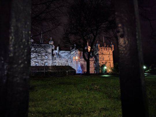 Harry Potter's George Hogwarts Heriots school viewed through the arched stone gatehouse from Lauriston Place Edinburgh