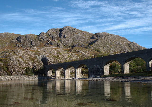 Loch nan Uamh Viaduct on the edge of a Loch houses a horse buried in rubble