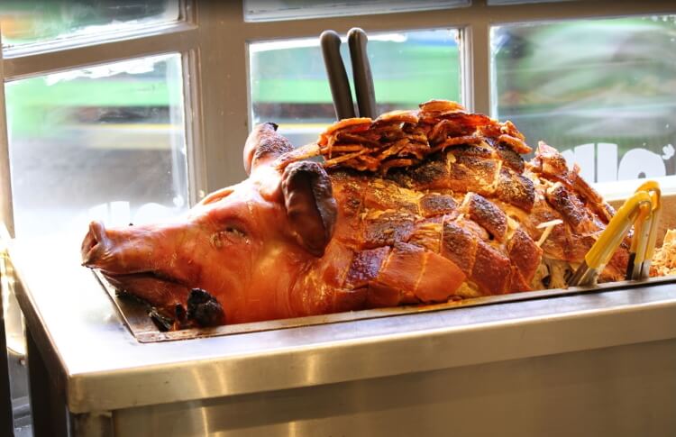 A skinned pig in Oink Victoria Street shop window