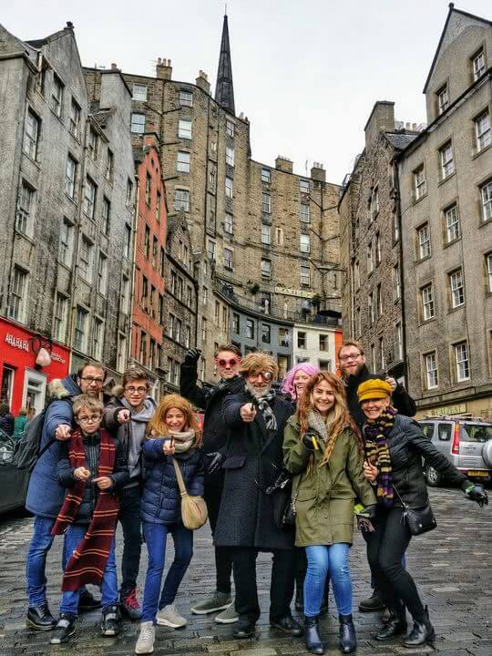 A Harry Potter tour dressed in cosplay poses on Victoria Street